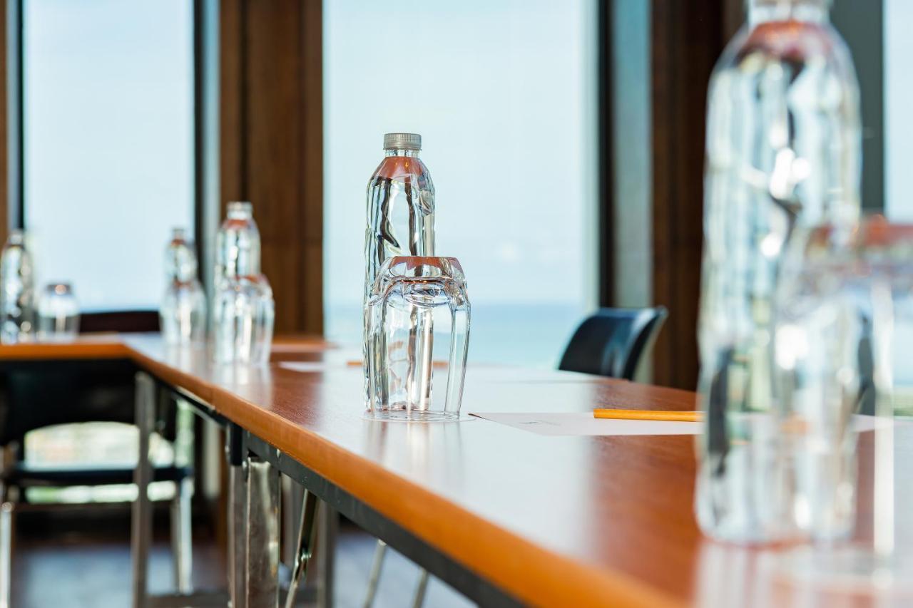 Arbour Hotel And Residence Pattaya Zewnętrze zdjęcie Bottled water on a table